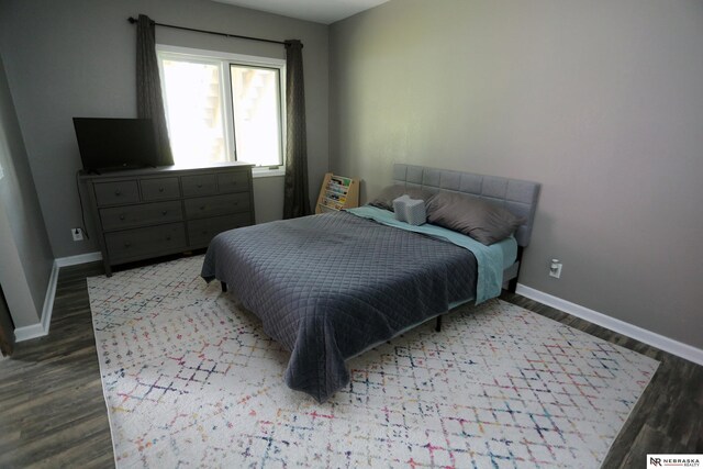 11915 S 53rd St, Papillion, NE 68133 - bedroom featuring wood finished floors and baseboards