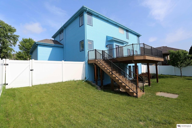 11915 S 53rd St, Papillion, NE 68133 - back of property featuring stairway, a gate, a deck, and a fenced backyard