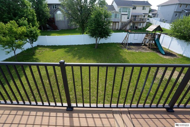 11915 S 53rd St, Papillion, NE 68133 - deck with a playground, a residential view, and a fenced backyard