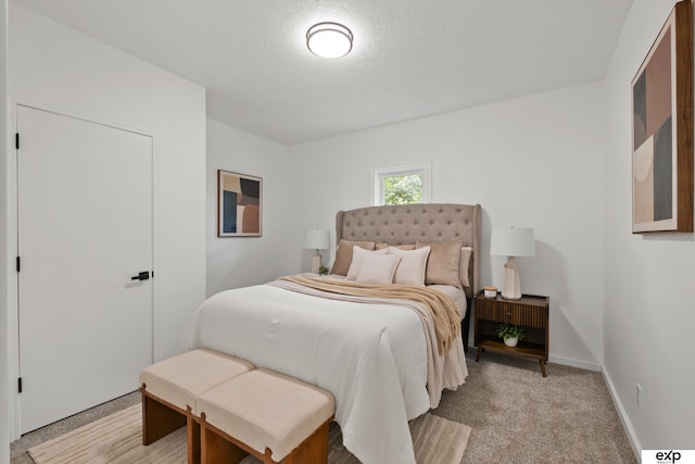 3279 Hascall St, Omaha, NE 68105 - bedroom featuring light colored carpet and a textured ceiling