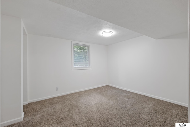 3279 Hascall St, Omaha, NE 68105 - additional living space featuring carpet flooring and a textured ceiling