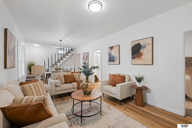 3279 Hascall St, Omaha, NE 68105 - living area with stairway and light wood-style flooring
