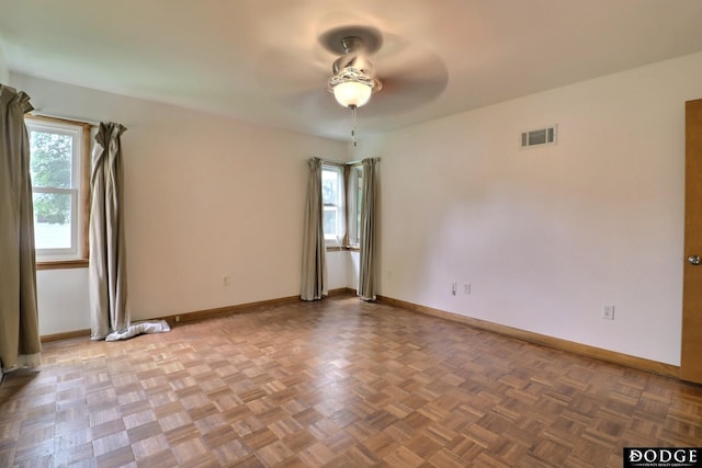 405 W 20th St, Fremont, NE 68025 - empty room featuring a ceiling fan and baseboards