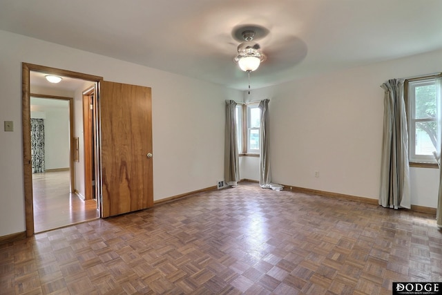 405 W 20th St, Fremont, NE 68025 - empty room featuring ceiling fan and baseboards