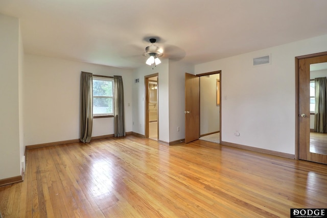 405 W 20th St, Fremont, NE 68025 - spare room with a ceiling fan and light wood-style flooring