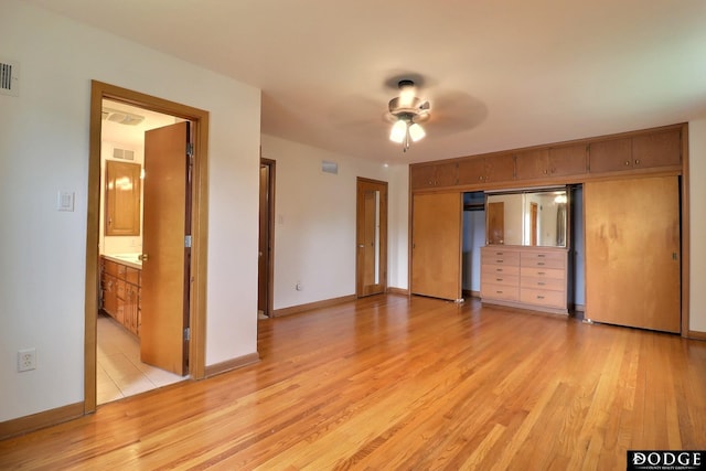 405 W 20th St, Fremont, NE 68025 - unfurnished bedroom featuring light wood finished floors and a closet