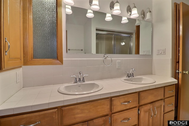 405 W 20th St, Fremont, NE 68025 - full bath with tasteful backsplash, double vanity, and a stall shower