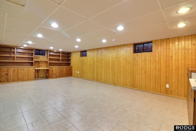 405 W 20th St, Fremont, NE 68025 - finished below grade area featuring a paneled ceiling, recessed lighting, and wood walls