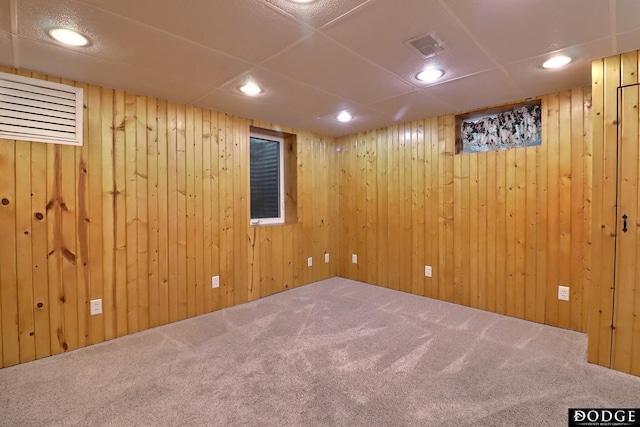 405 W 20th St, Fremont, NE 68025 - finished below grade area featuring carpet flooring, recessed lighting, and wooden walls