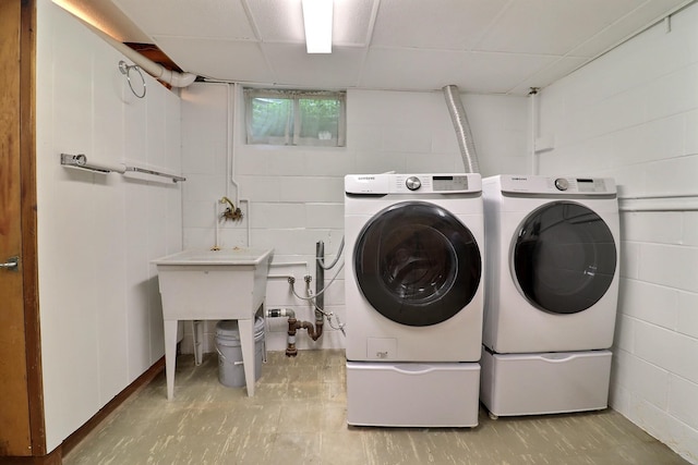 405 W 20th St, Fremont, NE 68025 - laundry area with concrete block wall and washer and dryer