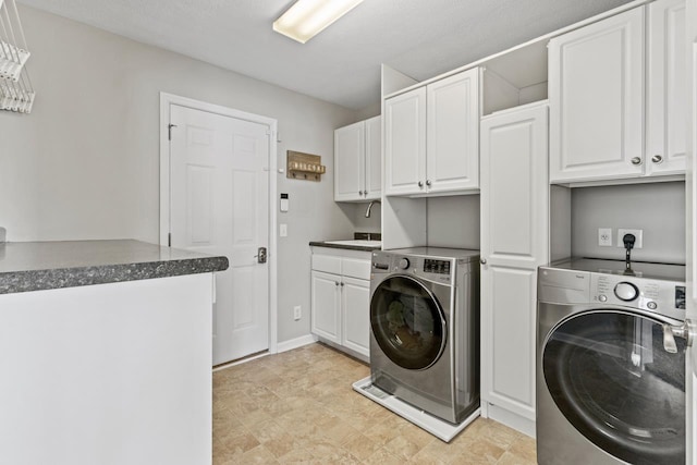 8917 N 157th St, Bennington, NE 68007 - laundry room featuring cabinet space and washing machine and clothes dryer