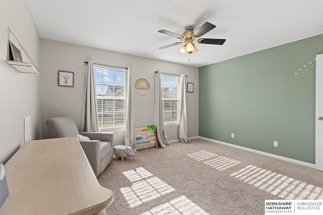 8917 N 157th St, Bennington, NE 68007 - sitting room featuring ceiling fan and carpet floors