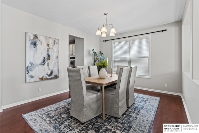 8917 N 157th St, Bennington, NE 68007 - dining space with a chandelier and wood finished floors