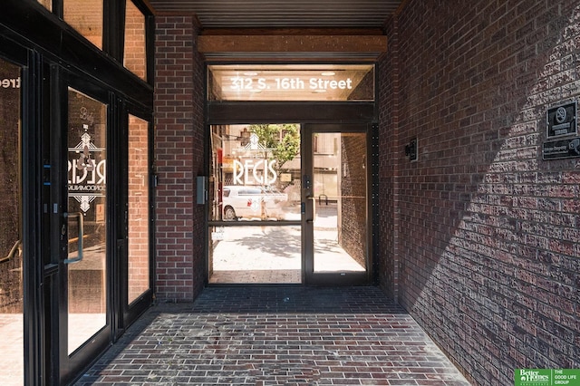 312 S 16th St Unit 904, Omaha, NE 68102 - property entrance with brick siding
