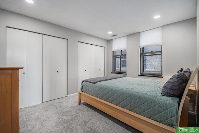 312 S 16th St Unit 904, Omaha, NE 68102 - carpeted bedroom featuring multiple closets and recessed lighting