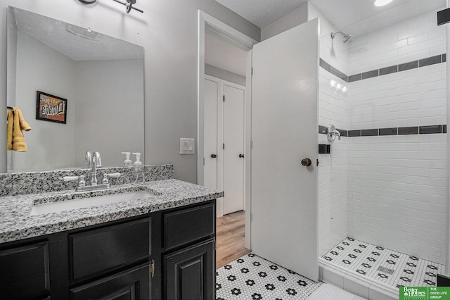 312 S 16th St Unit 904, Omaha, NE 68102 - full bath featuring a tile shower and vanity