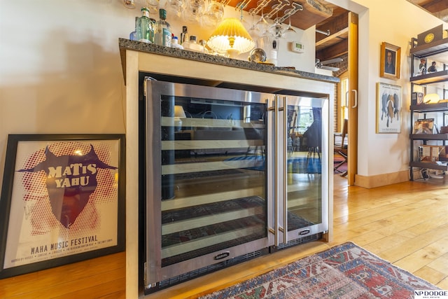105 S 9th St Unit 308, Omaha, NE 68102 - detailed view of beverage cooler and wood finished floors