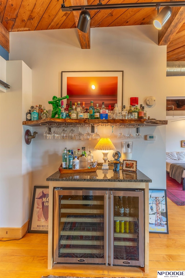 105 S 9th St Unit 308, Omaha, NE 68102 - indoor dry bar with wine cooler, wooden ceiling, and light wood-type flooring