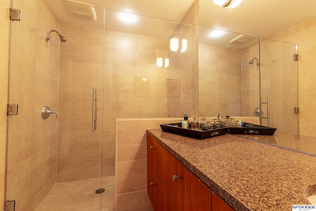 105 S 9th St Unit 308, Omaha, NE 68102 - bathroom featuring vanity and a stall shower