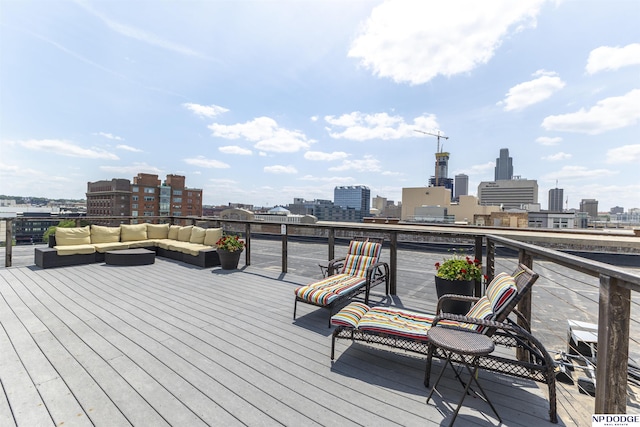 105 S 9th St Unit 308, Omaha, NE 68102 - wooden terrace featuring a skyline view and an outdoor living space