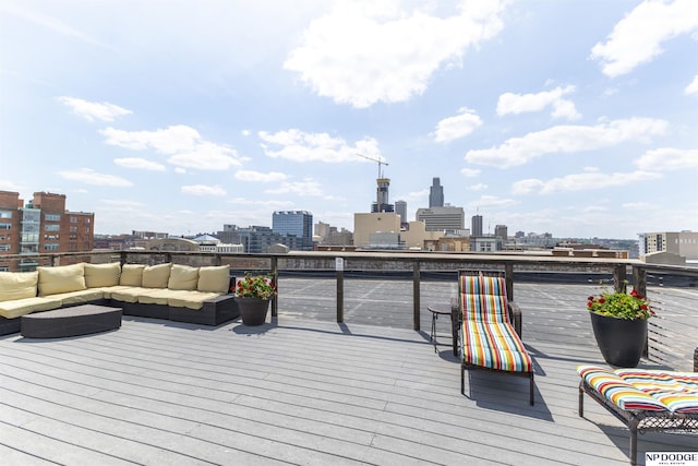 105 S 9th St Unit 308, Omaha, NE 68102 - wooden terrace featuring a view of skyline and outdoor lounge area