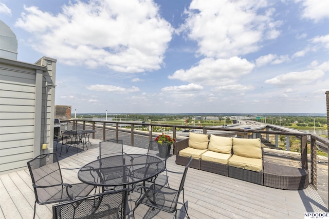 105 S 9th St Unit 308, Omaha, NE 68102 - wooden deck with outdoor dining space and an outdoor living space
