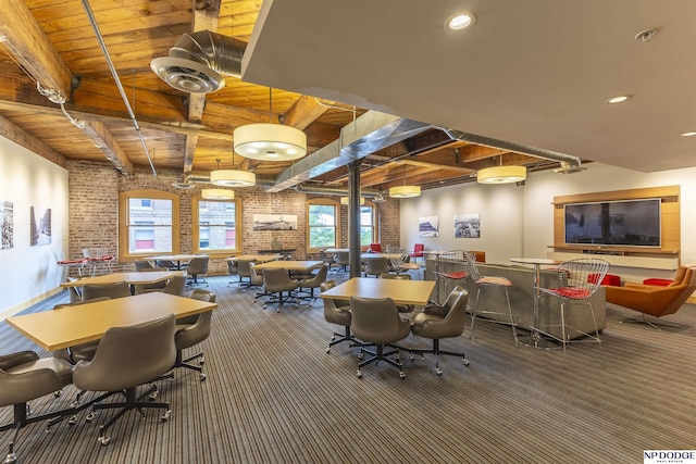 105 S 9th St Unit 308, Omaha, NE 68102 - dining area with brick wall, a wood ceiling with exposed beams, carpet floors, and recessed lighting