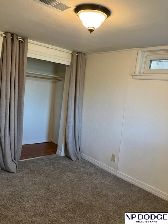 4501 S 48th St, Lincoln, NE 68516 - unfurnished bedroom featuring carpet floors and a closet