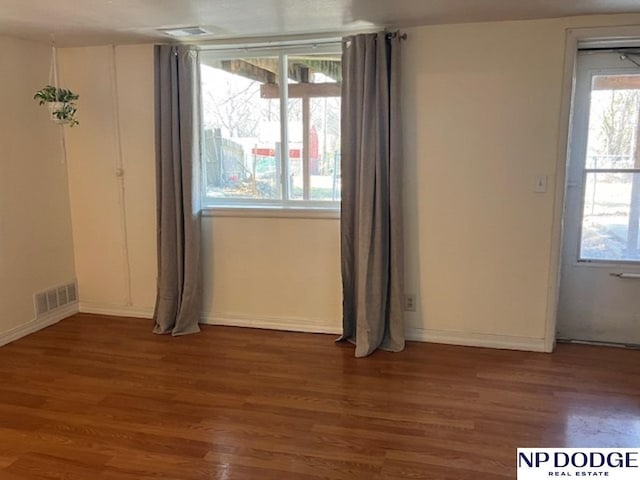 4501 S 48th St, Lincoln, NE 68516 - spare room featuring wood finished floors and baseboards