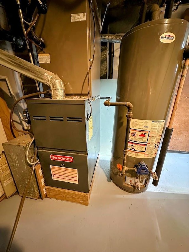 623 S 33rd St, Omaha, NE 68105 - utility room featuring gas water heater and heating unit