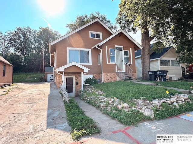 623 S 33rd St, Omaha, NE 68105 - view of front facade featuring entry steps and brick siding