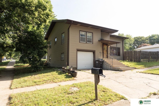 503 E 12th St, York, NE 68467 - view of front of property featuring an attached garage and driveway