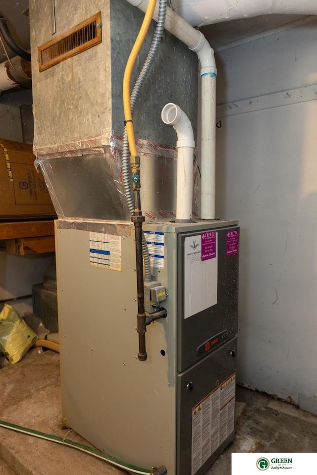 503 E 12th St, York, NE 68467 - utility room with heating unit