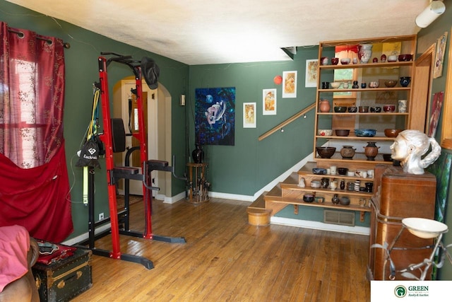 503 E 12th St, York, NE 68467 - workout room with wood finished floors and arched walkways