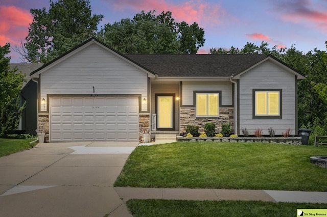 15436 Fowler Ave, Omaha, NE 68116 - ranch-style home featuring a garage, driveway, stone siding, a lawn, and roof with shingles