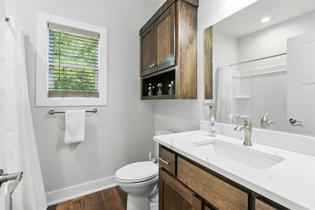 15436 Fowler Ave, Omaha, NE 68116 - full bath featuring vanity, wood finished floors, and curtained shower