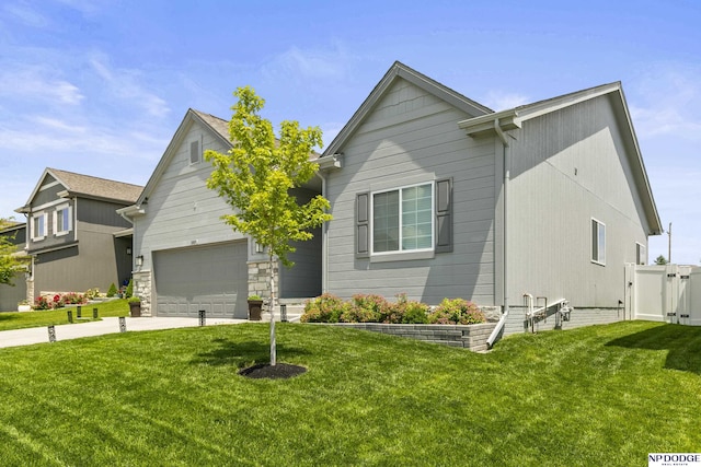 5003 N 180th Ave, Elkhorn, NE 68022 - view of front of property with a front lawn, concrete driveway, and a gate