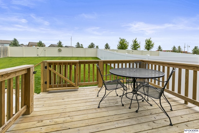 5003 N 180th Ave, Elkhorn, NE 68022 - wooden deck with a fenced backyard and outdoor dining space
