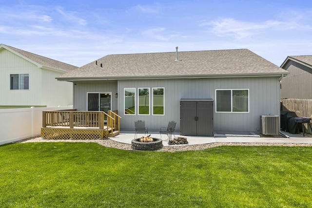 5003 N 180th Ave, Elkhorn, NE 68022 - rear view of house featuring a fire pit, a wooden deck, and a shingled roof