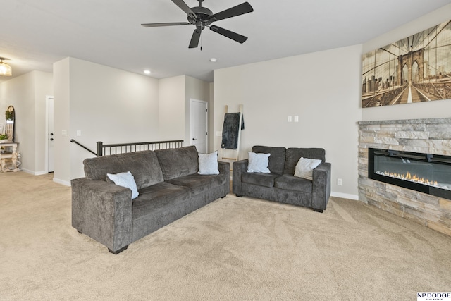 5003 N 180th Ave, Elkhorn, NE 68022 - living room with carpet floors, a fireplace, a ceiling fan, and recessed lighting