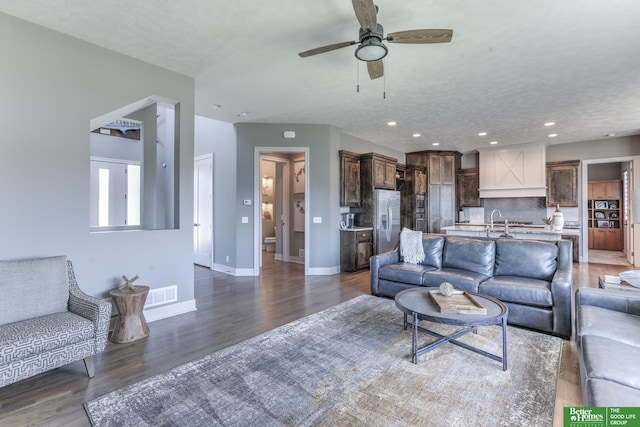 20761 Shirley St, Omaha, NE 68022 - living room featuring wood finished floors, a ceiling fan, and recessed lighting
