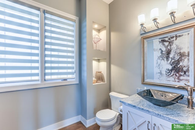 20761 Shirley St, Omaha, NE 68022 - bathroom with wood finished floors and vanity