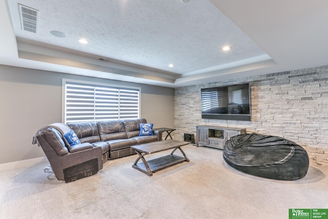 20761 Shirley St, Omaha, NE 68022 - carpeted living area featuring a tray ceiling, a textured ceiling, and recessed lighting