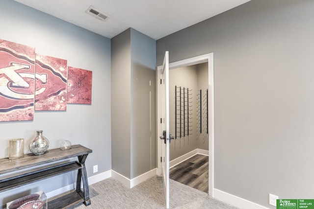 20761 Shirley St, Omaha, NE 68022 - hallway with baseboards and carpet