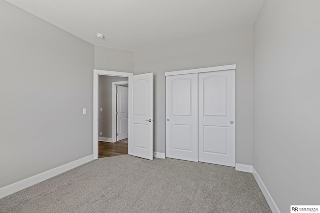 7530 Augustine Ave, Lincoln, NE 68516 - unfurnished bedroom with carpet and a closet