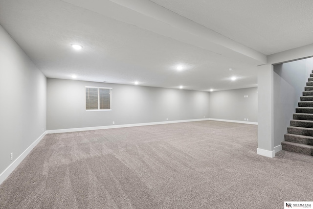 7530 Augustine Ave, Lincoln, NE 68516 - finished basement featuring stairs, carpet, and recessed lighting