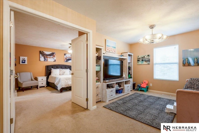 16228 Virginia St, Omaha, NE 68136 - carpeted living area with a chandelier and baseboards