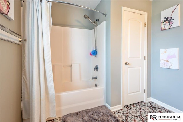 16228 Virginia St, Omaha, NE 68136 - full bathroom with shower / bath combination with curtain and baseboards
