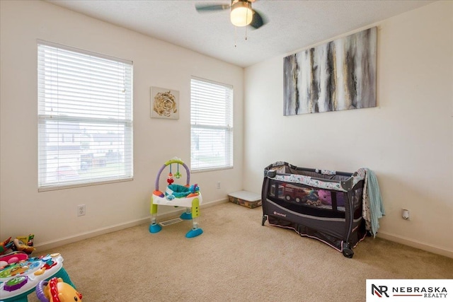 16228 Virginia St, Omaha, NE 68136 - carpeted bedroom featuring baseboards and ceiling fan