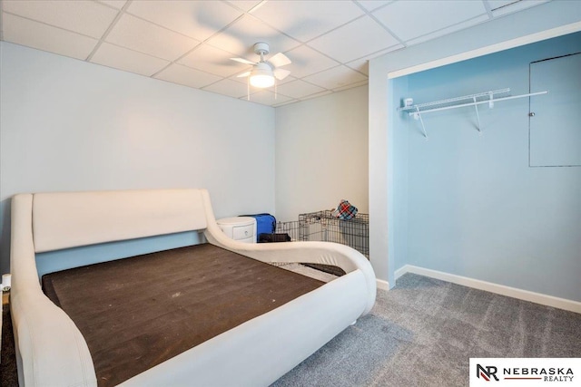 16228 Virginia St, Omaha, NE 68136 - carpeted bedroom with a paneled ceiling and ceiling fan